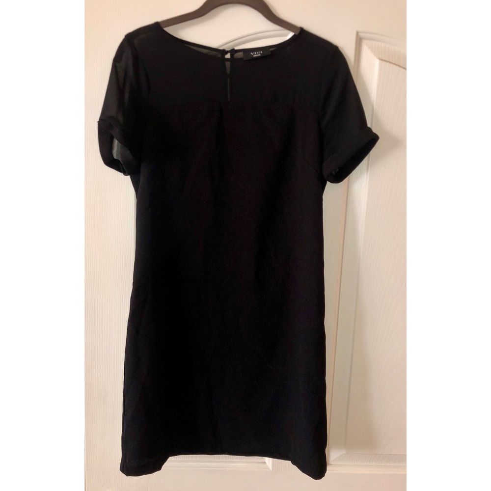 Black shift dress with sheer upper chest area